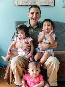 Dr. Steve Martin with three children in Beijing